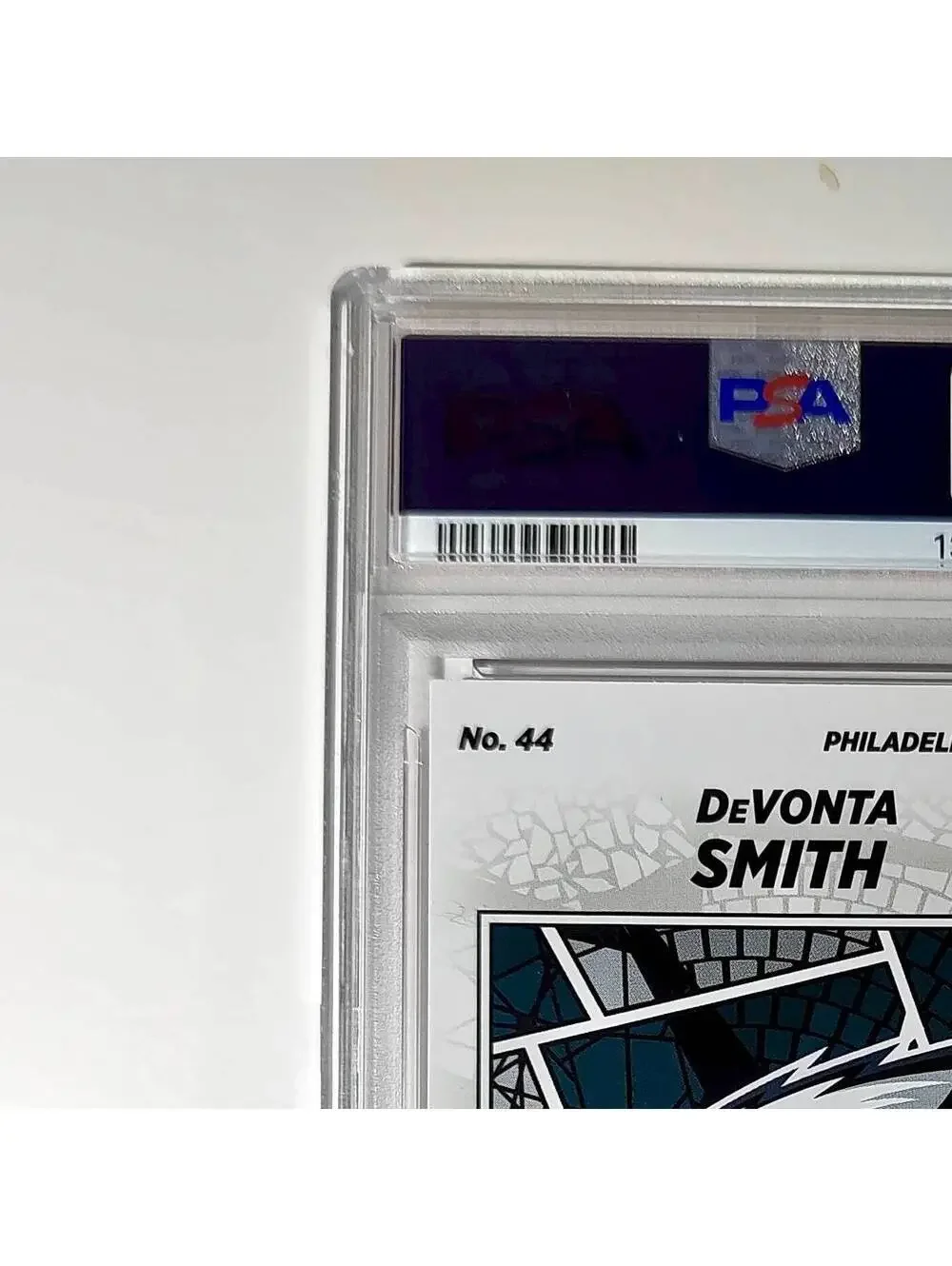 DeVonta Smith 2024 Panini Sticker Collection 048/299 #44 Red Foil PSA 9 Mint
